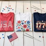 Cute 4th of July shirts flat lay with patriotic designs from Printify Gifts